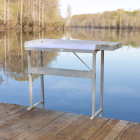 MAXXTUFF Dock-Mounted Fish Fillet Table mounted on pier
